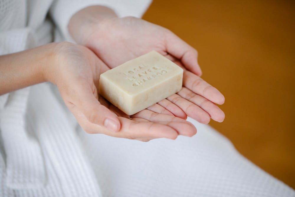 holding a bar of soap