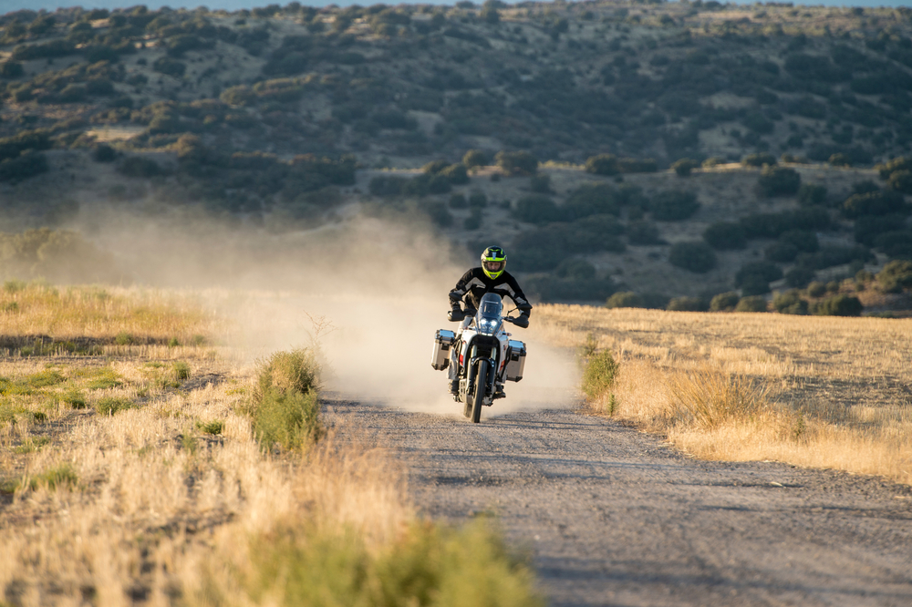 man riding a dual sport motorcycle