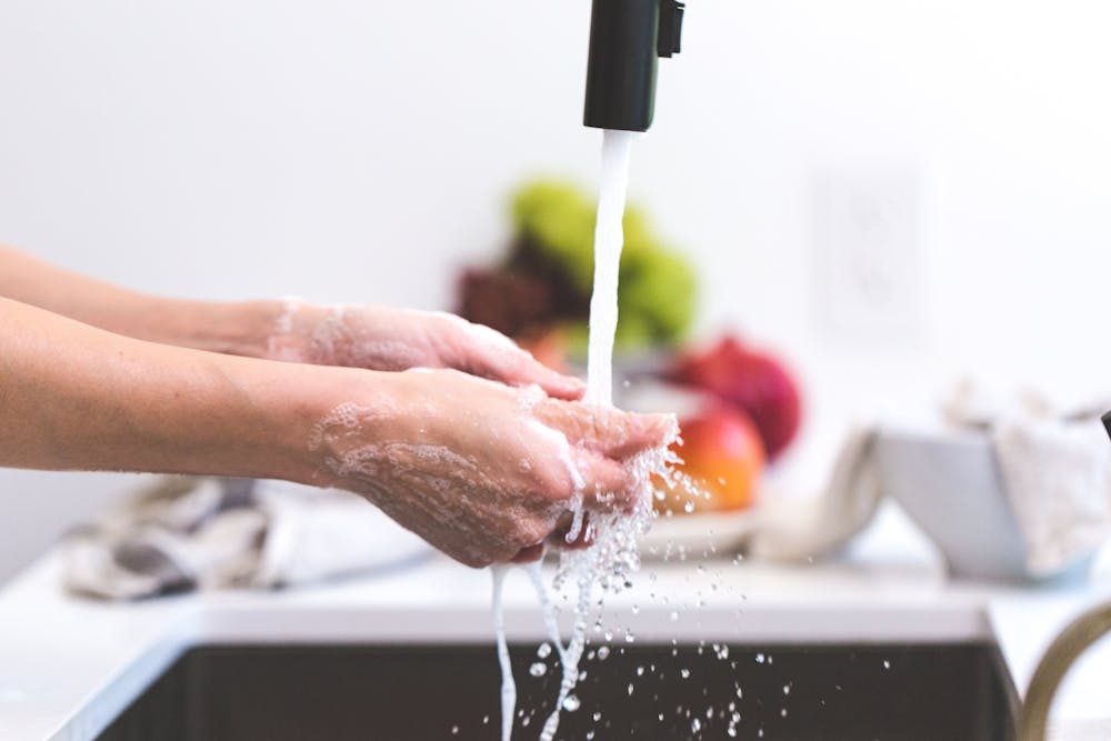rinsing hands thoroughly