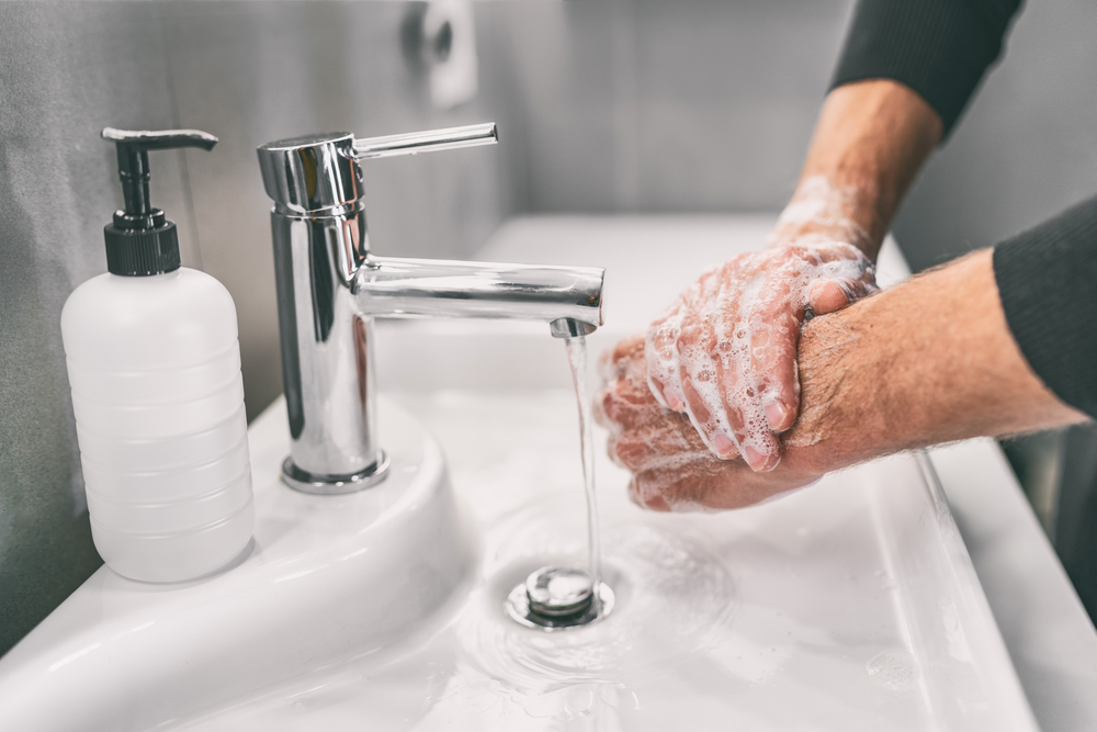 scrubbing hands while washing