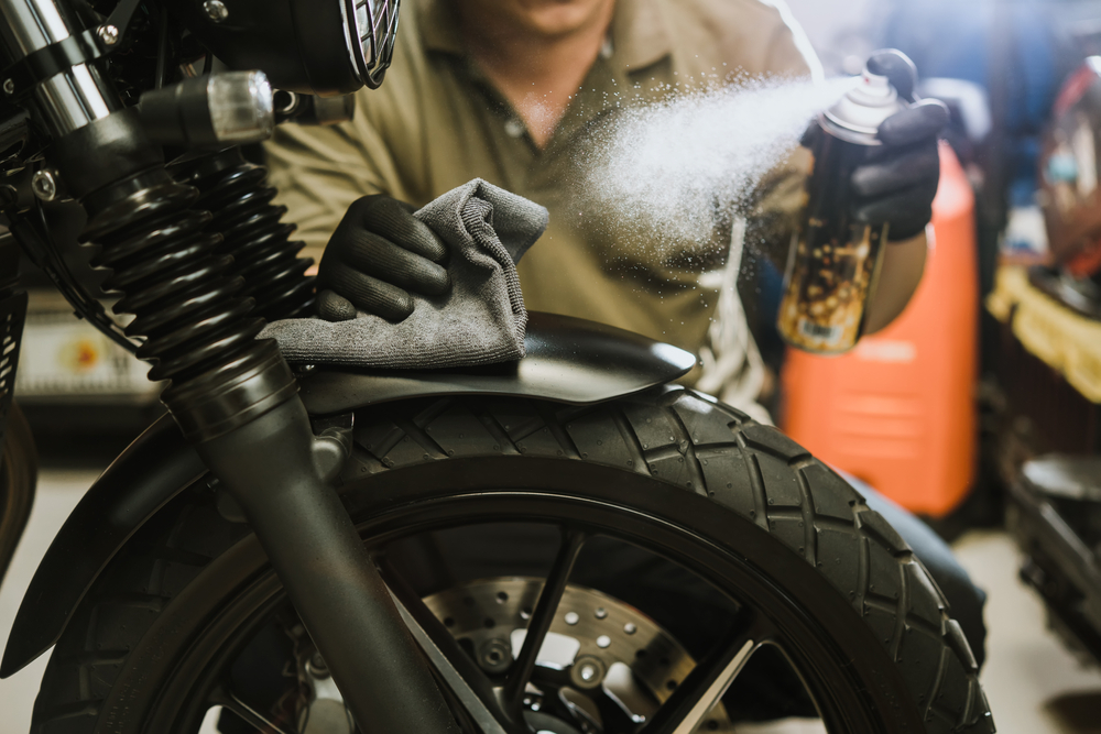 using a motorcycle cleaning spray