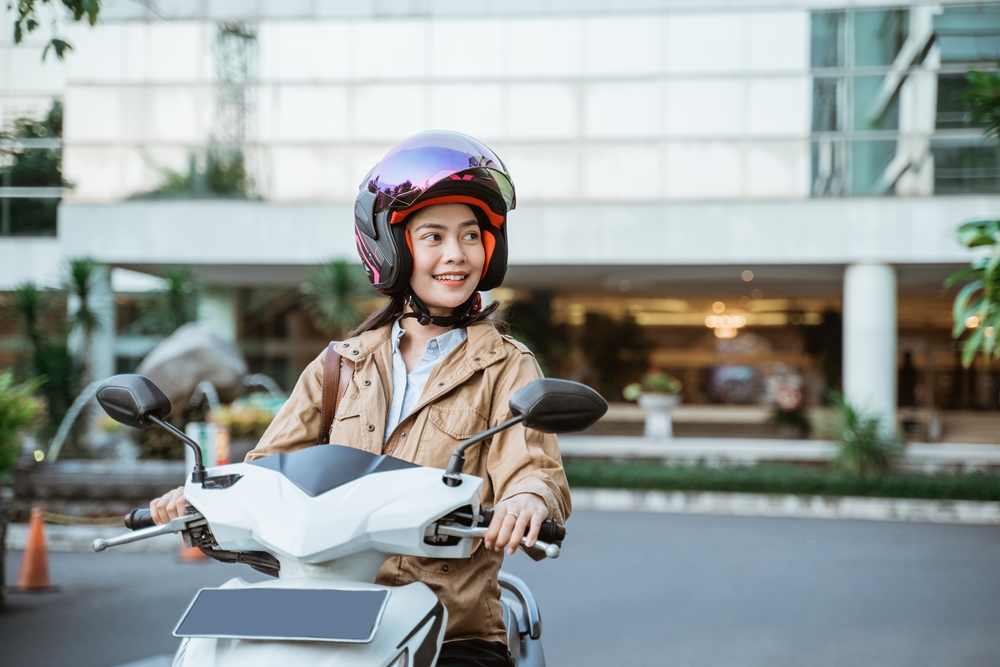 woman riding a motorcycle